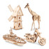 A collection of wooden novelty items including a windmill, giraffe, boat, and motorcycle model kits.