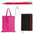 A red pen, a clear bottle of hand sanitizer, a pink tote bag, and a black notebook with an orange elastic band.