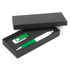 A pen with a green grip and a white barrel, accompanied by a USB flash drive, both presented in a sleek black box.