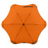 An orange BLUNT Metro Umbrella with an octagonal shape and a central button, featuring a logo.