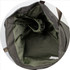 An olive green crossbody bag featuring a spacious interior with a soft lining and a built-in pocket.