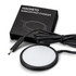 A wireless fast charger in black, with a charging cable and packaging featuring a logo.