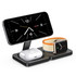A wireless charging station featuring a black design, capable of charging a phone, AirPods, and a smartwatch.