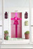 Pink oversized door bow displayed on a front door for weddings, events and premium presentations