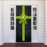 Lime green oversized door bow attached to a front door for real estate handovers and event displays