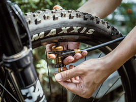 Topeak TubiHead Pump Upgrade Kit inflates a tubeless tire