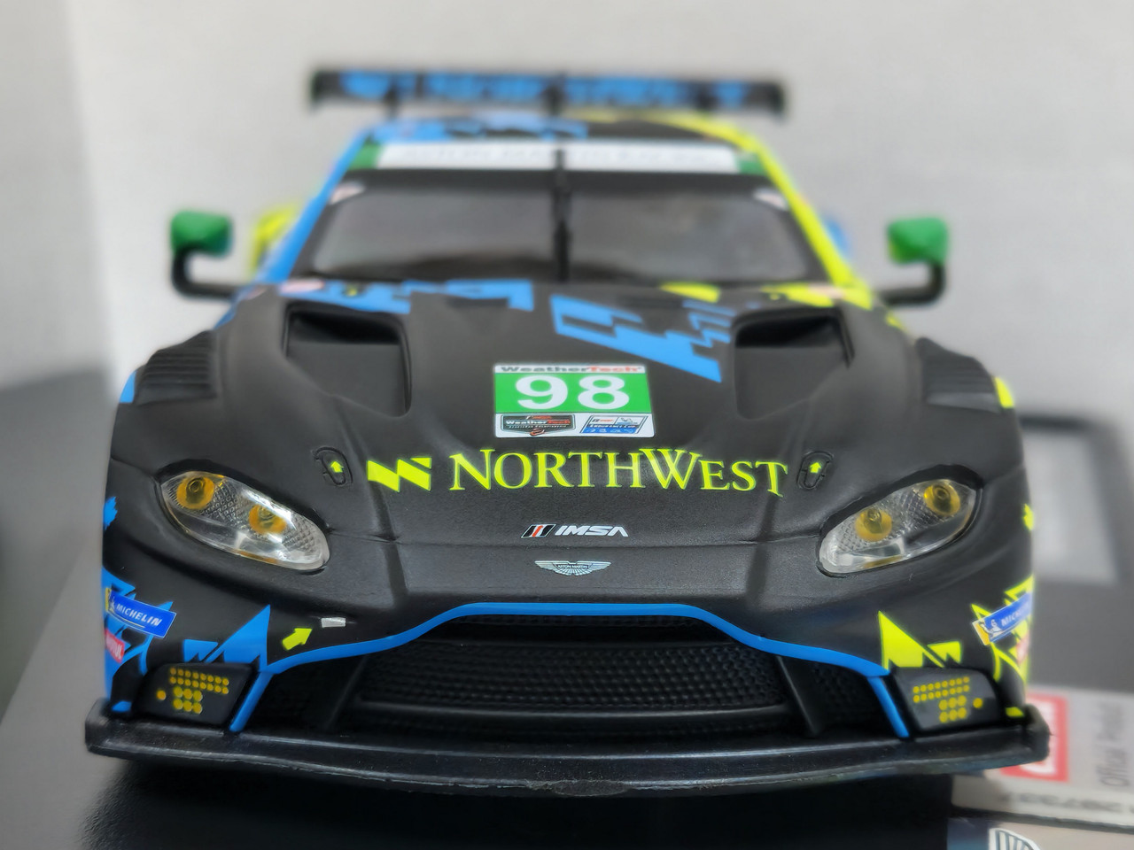 Carrera, a group of 1:32nd scale Aston Martin Slot Cars to