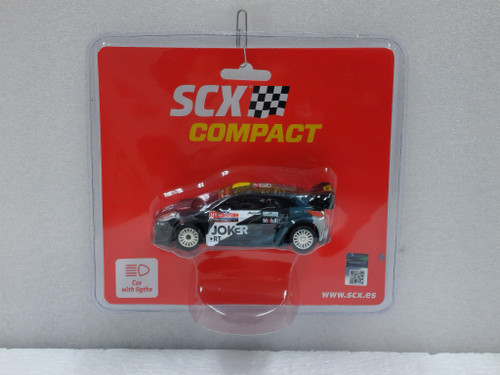 C10515X300 SCX Compact Ford Puma WRC Joker Rally Chile '23 - A. Heller/ L. E. Allende, #28 1:43 Slot Car