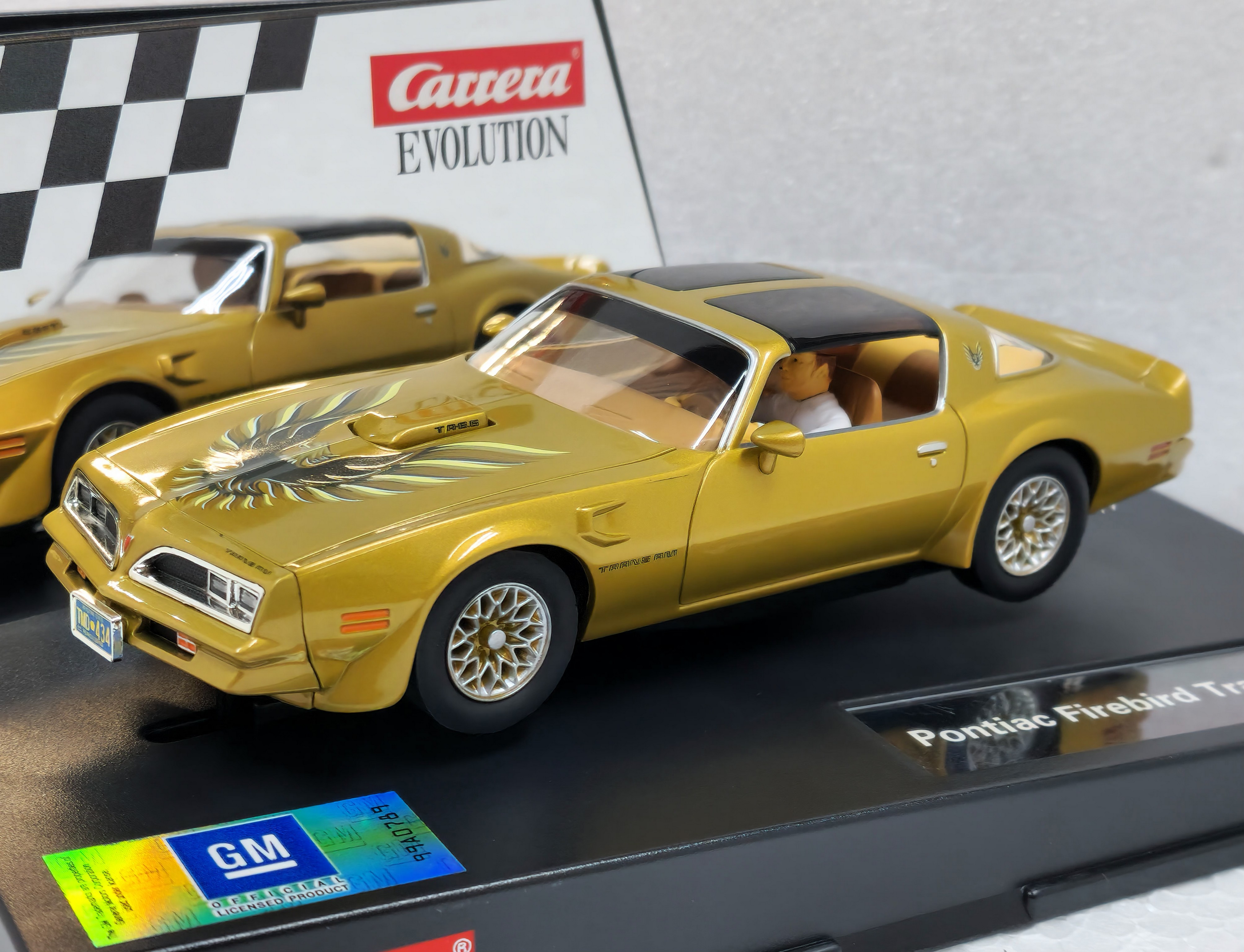 27463 Carrera Evolution Pontiac Firebird Trans-Am '77 Gold 1:32