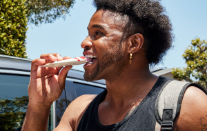 Boy eating bar