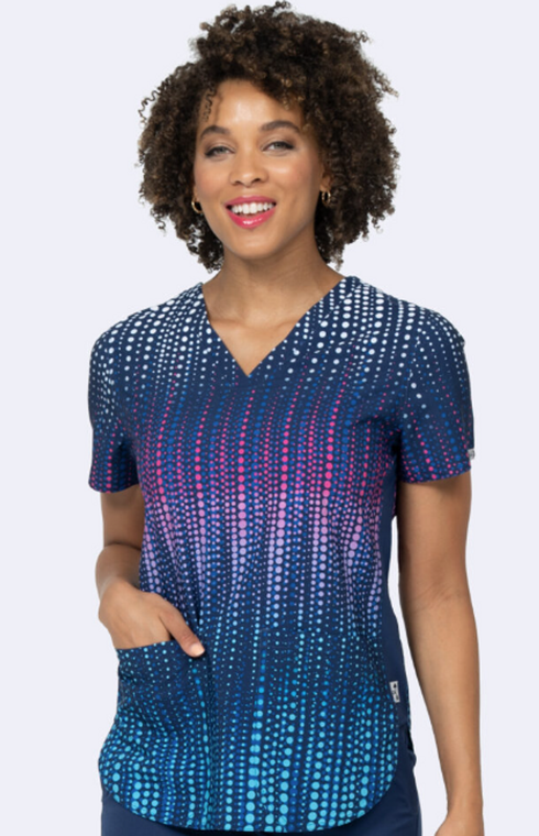woman purple and blue scrub top with dots