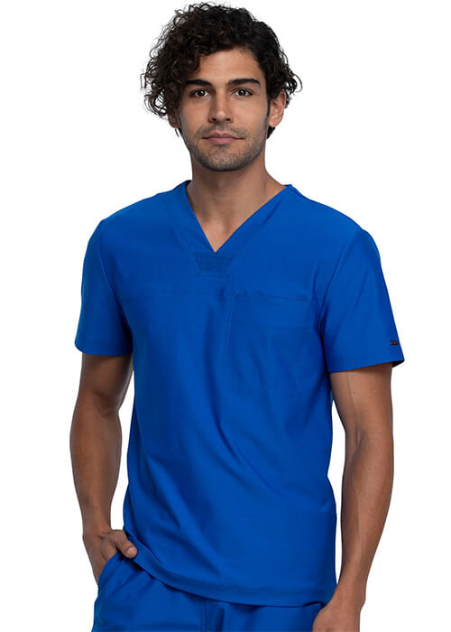 Medical professional wearing a comfortable royal blue scrub shirt