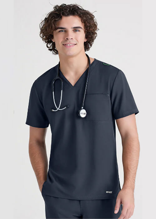 Male medical professional wearing steel grey scrubs