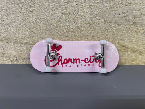 Custom Made 5 ply maple fingerboard with single axle trucks, rubber bushings, locking wheel nuts, Bearing wheels, and foam griptape. 