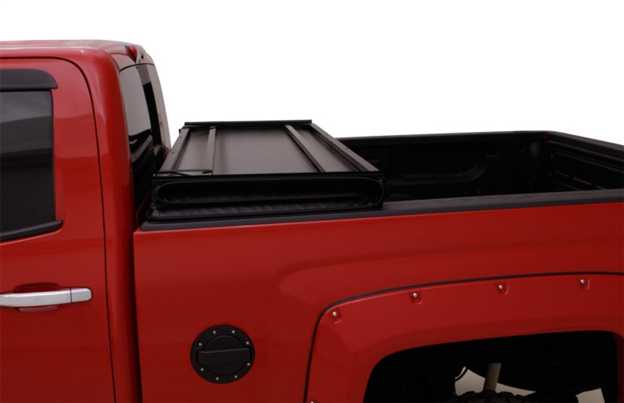 Lund 02-17 Dodge Ram 1500 Fleetside (6.4ft. Bed) Hard Fold Tonneau Cover - Black - 969250 Photo - Mounted