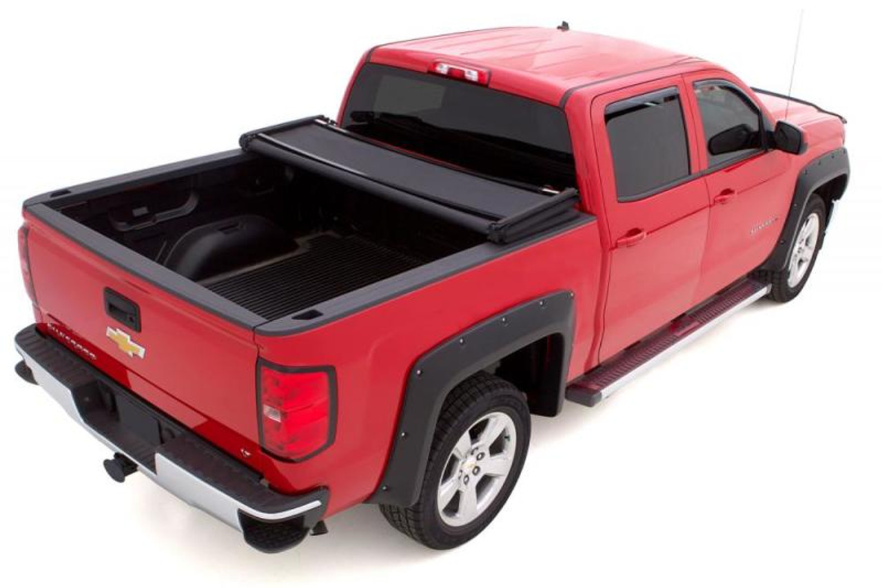 Lund 15-18 Ford F-150 (5.5ft. Bed) Genesis Elite Tri-Fold Tonneau Cover - Black - 958172 Photo - Mounted