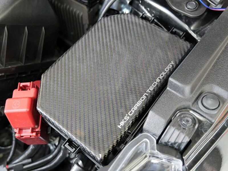 HKS 2023 Toyota GR Corolla Dry Carbon Fuse Box Cover - 70026-AT014 Photo - Close Up