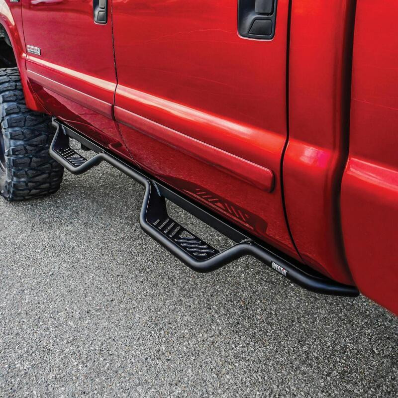 Westin 1999-2016 Ford F-250/F-350/F-450/F-550 Crew Cab Outlaw Drop Nerf Step Bars Textured Black - 20-11335 Photo - Mounted