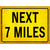 Next 7 Miles Novelty Metal Parking Sign