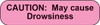 Pink rounded sticker with black text CAUTION May cause Drowsiness