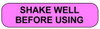 Pink rounded rectangle stickers with black text SHAKE WELL BEFORE USING