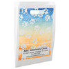 White die-cut handle paper bag featuring white paw prints over a blue, green, yellow, and orange gradient background.

