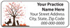 Veterinary label with autumn tree, falling leaves, dog and cat silhouettes, and pumpkins