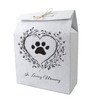 Plantable memorial bag featuring a black paw print inside a heart with floral accents and the phrase “In Loving Memory” beneath.