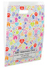 White die-cut handle paper bag featuring colorful pet care icons including paw prints, hearts, bones, dog houses, flowers, stars, ribbons, clouds, and suns.

