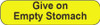 Yellow rounded rectangle stickers with black text Give on Empty Stomach