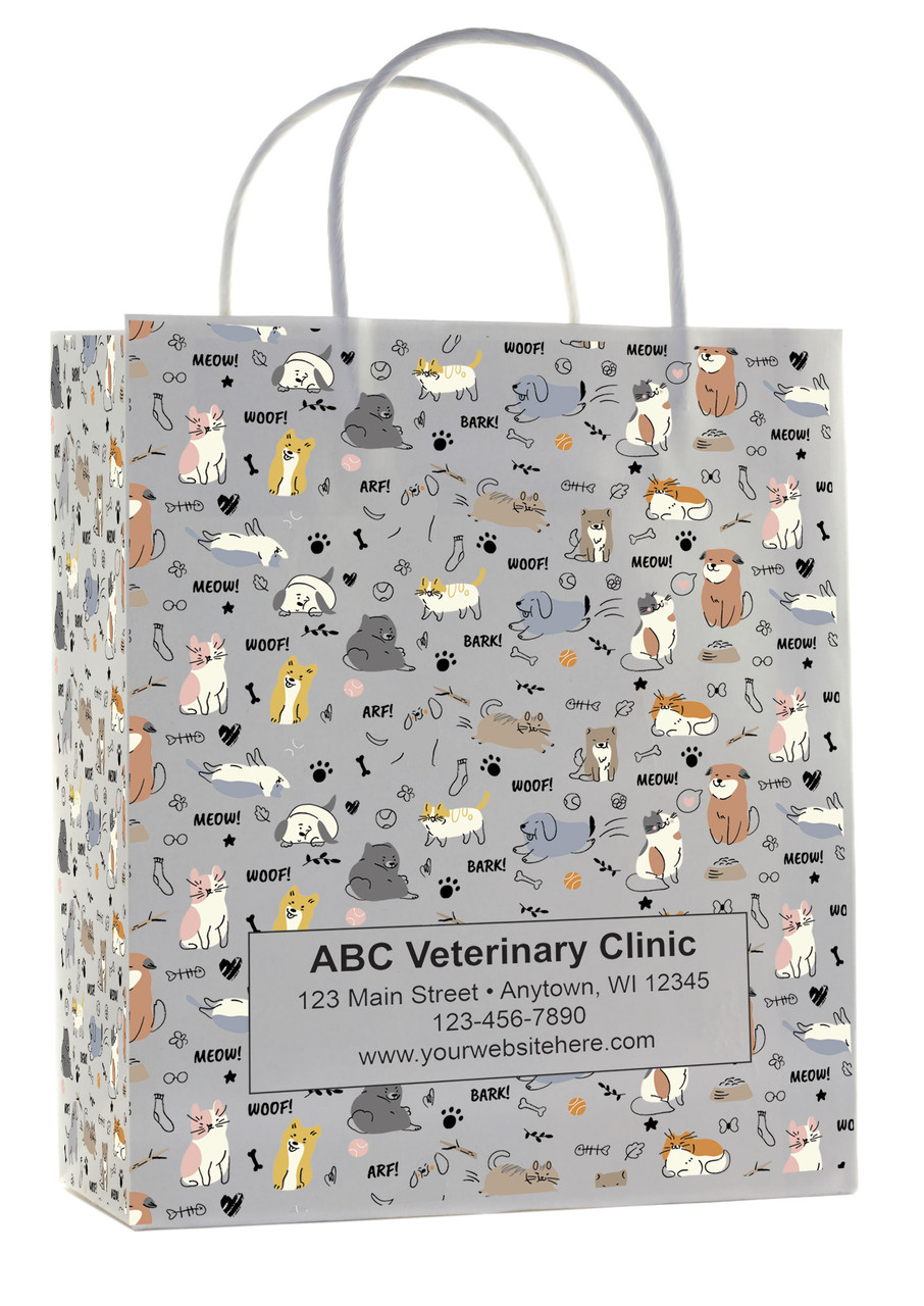 White handled veterinary prescription bags showing a repeating pattern of illustrated dogs and cats with paw prints, bones, and “WOOF!”, “MEOW!”, “BARK!” text, with a centered label panel for clinic details.