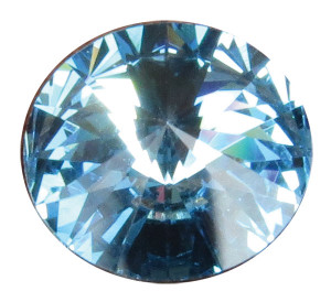 Round March crystal gemstone with an aquamarine-blue faceted design and reflective surface, shown individually and displayed as an accent option on a memorial paw print keepsake.

