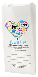 White flat bottom veterinary prescription bag featuring a heart shape made of colorful dog and cat silhouettes with paw prints, “WE LOVE PETS!” text, and a write-on panel below
