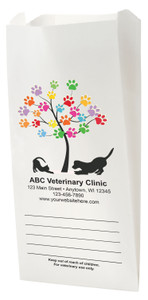 White Paper veterinary prescription bag with colorful paw print tree and pet silhouette design.
