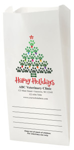 White Paper veterinary prescription bag with holiday paw print tree design.