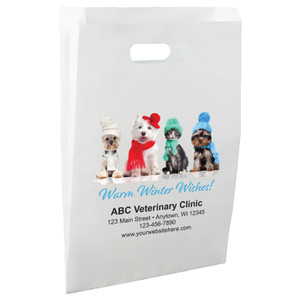 White die-cut handle paper bag featuring three dogs and one cat wearing colorful winter hats and scarves above the message "Warm Winter Wishes!"

