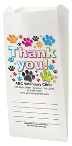 White Paper veterinary prescription bag with colorful paw prints and bold Thank You design.