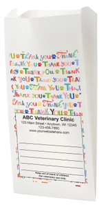 White Paper veterinary prescription bag with colorful Thank You pattern and paw prints.