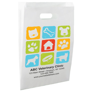 White die-cut handle paper bag featuring a colorful grid of pet-themed icons including cat faces, dog faces, paw prints, a bone, collar, pet house, and pet silhouettes.