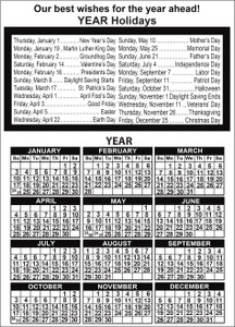 Wide personalized calendar featuring colorful dog and cat portraits on a black background, white year calendar grid, and custom business imprint area at the top.