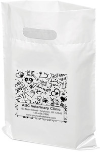 White plastic veterinary tote bag with a die-cut handle featuring a black pattern of paw prints, hearts, and repeated "Thank You" text surrounding a personalized clinic information panel displaying ABC Veterinary Clinic, address, phone number, and website.