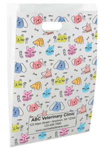 White die-cut handle paper bag featuring colorful cat and dog faces, hearts, paw prints, bones, and fishbone graphics in a repeating pattern.

