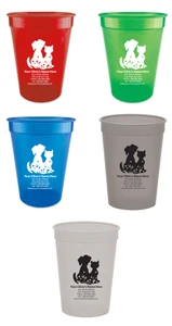Personalized pet food measuring cup featuring a sitting dog and cat silhouette with heart accents and floral artwork above custom veterinary clinic contact information. Available in multiple cup colors with black or white imprint options.