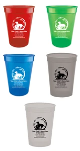 Personalized pet food measuring cup featuring a dog and cat silhouette inside a decorative circular leaf border with custom clinic name, address, phone number, fax number, and website information printed below.