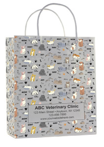 White handled veterinary prescription bags showing a repeating pattern of illustrated dogs and cats with paw prints, bones, and “WOOF!”, “MEOW!”, “BARK!” text, with a centered label panel for clinic details.