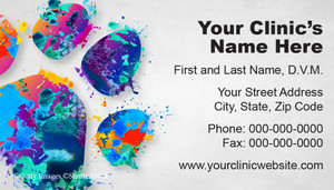 
Veterinary business card featuring a large multicolored watercolor paw print with paint splatter effects and clinic contact information on a light gray background.

