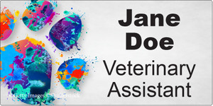 Personalized name tag featuring a large multicolored watercolor paw print with blue, teal, purple, pink, orange, and yellow paint splatter artwork on a light gray background with bold black name and title text.


