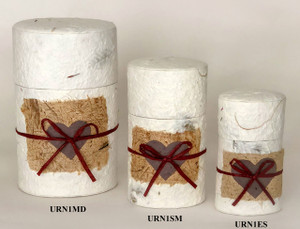 Pet Peaceful Return Natural Oval Small pet memorial urn with natural fiber paper accent, dark brown heart detail, and red ribbon bow.
