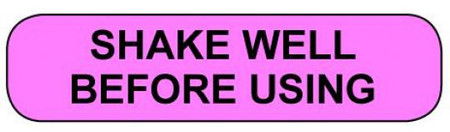 Pink rounded rectangle stickers with black text SHAKE WELL BEFORE USING