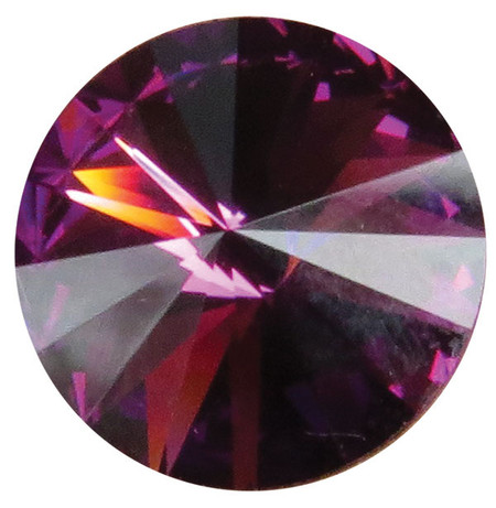 Round purple February crystal gemstone with a faceted cut design and reflective surface, shown individually and displayed as an accent option on a memorial paw print keepsake.

